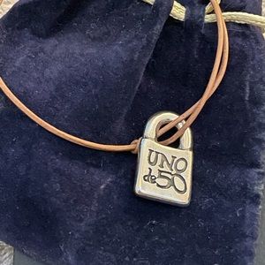 UNO DE 50 thin leather bracelet. Large charm